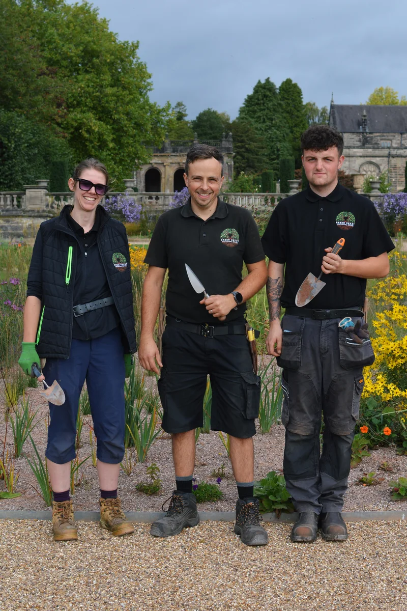 Green Heart horticulturists Jess, Dave and Calum standing together in Trentham Gardens’ Italian Garden.